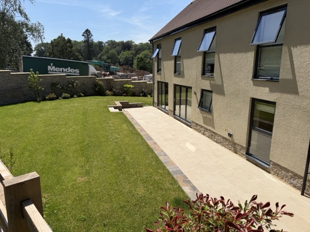 Rear of Plot 20 with another delivery of doors in the background 